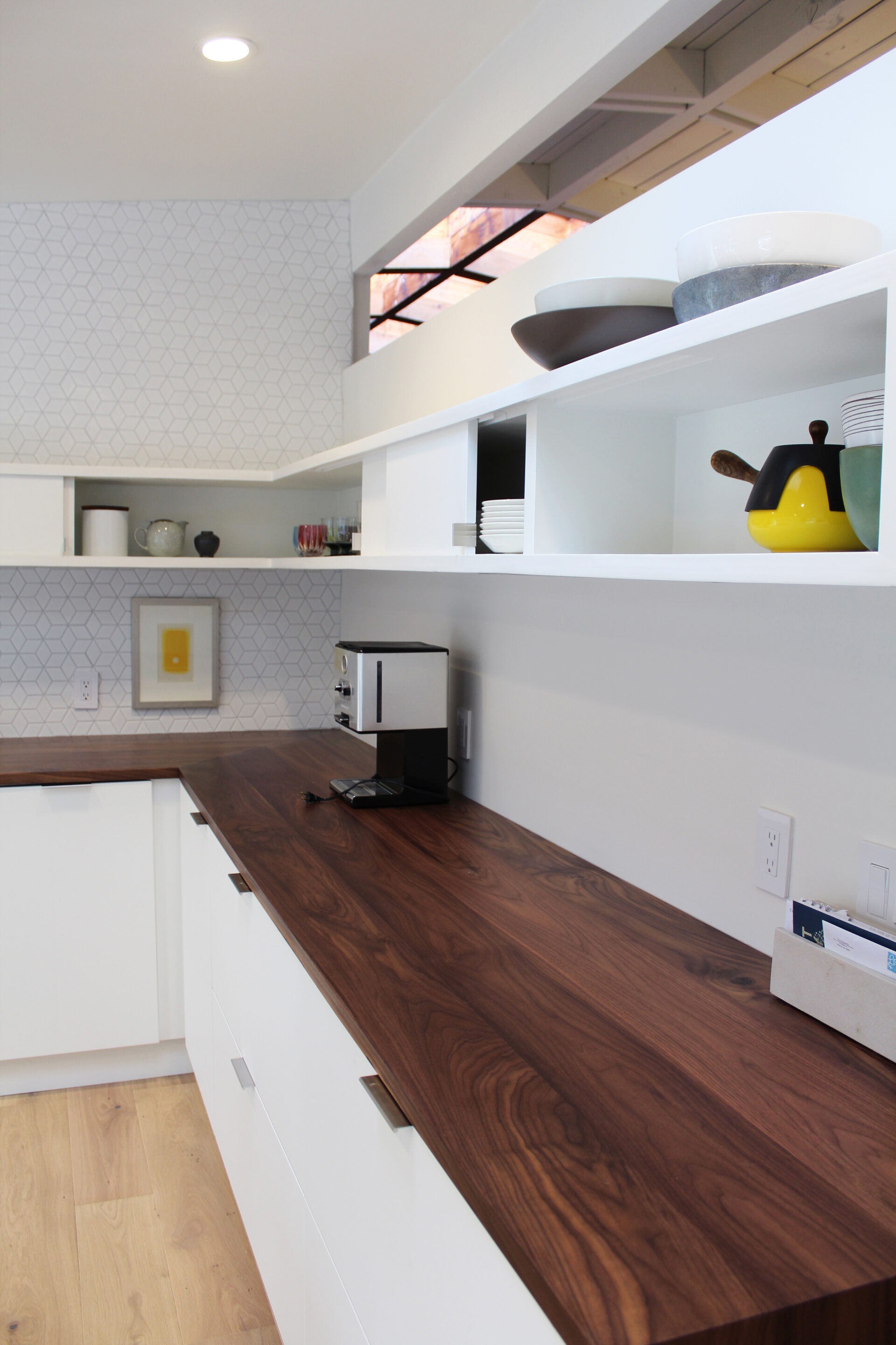 Concord Residence, plywood-lined toilet nook with built-in shelving