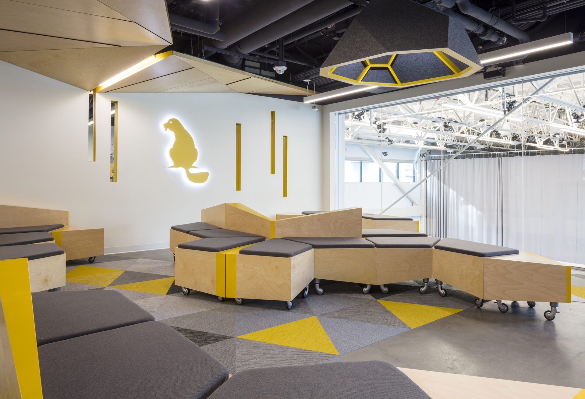 MIT Beaver Works AeroAstro, lounge seating with beaver logo wall