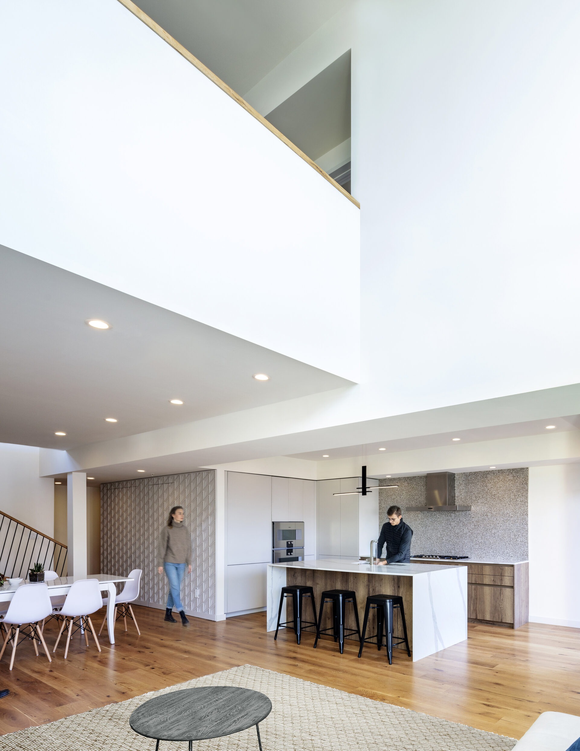 West Broadway Housing, interior double-height kitchen and dining
